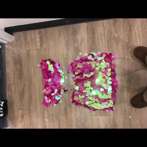 A sequin set that cross ties in the back